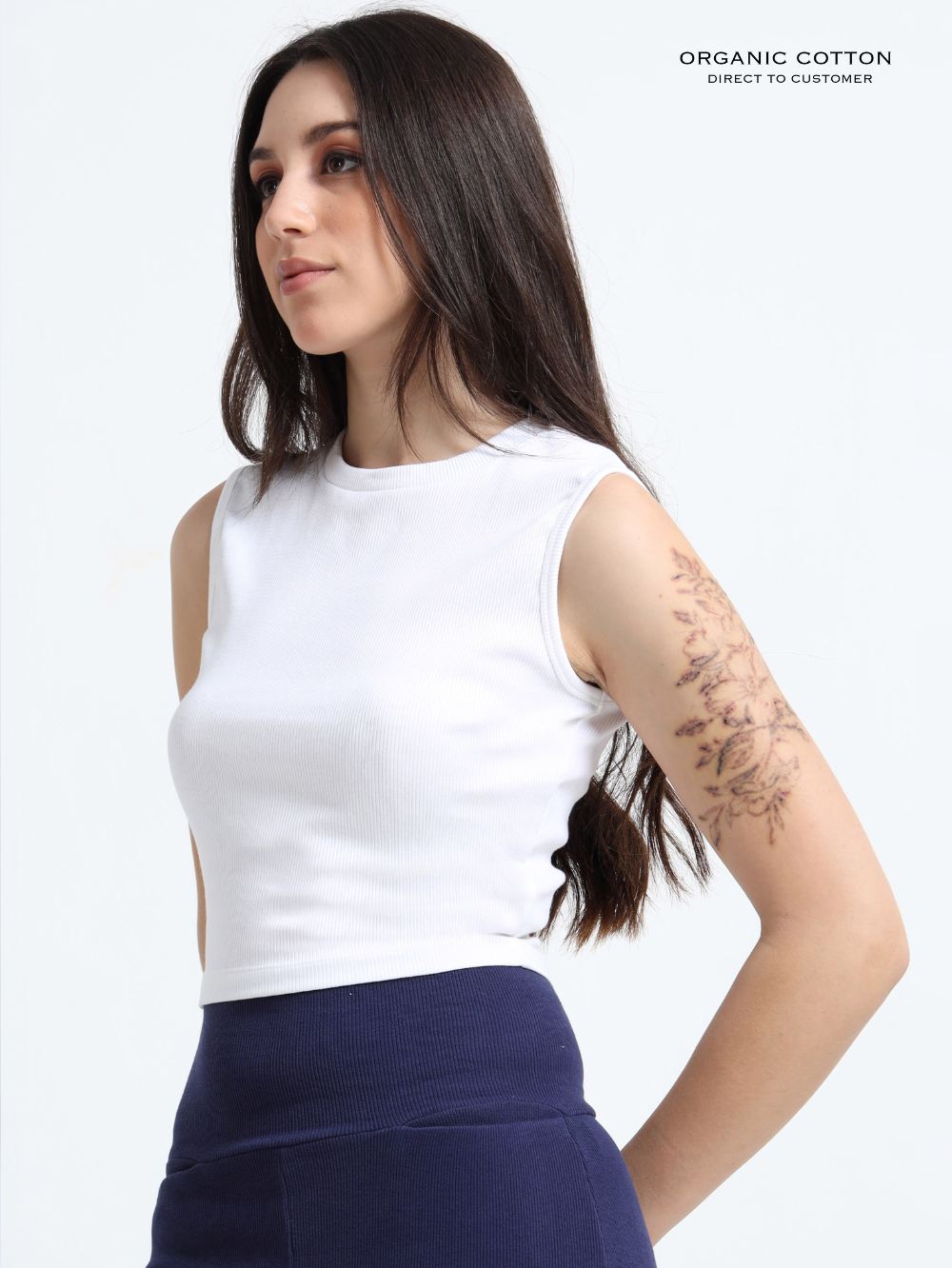 WHITE ORGANIC COTTON RIB SLEEVE LESS ROUND NECK FITTED CROP TOP